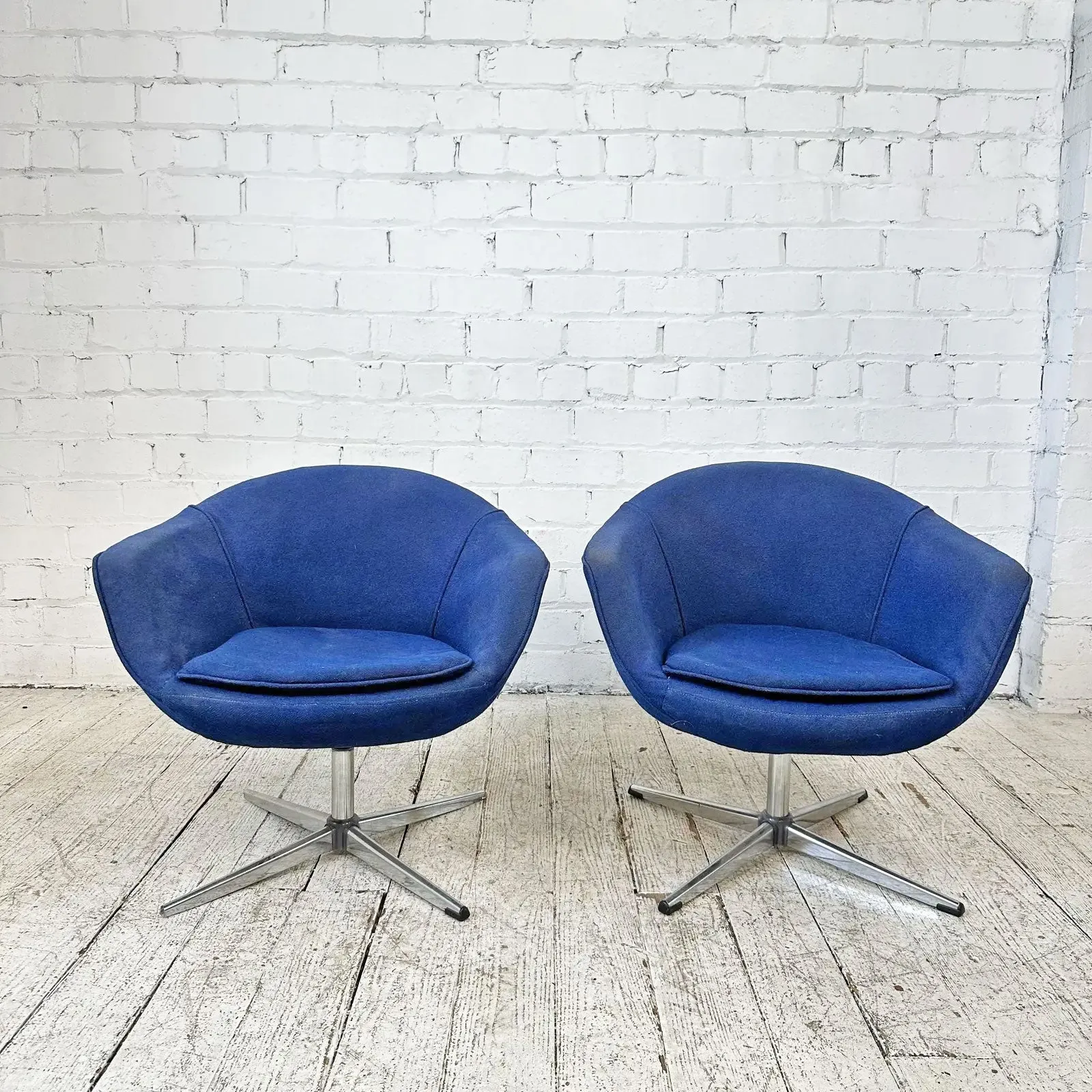 Pair of Overman Swivel Chairs