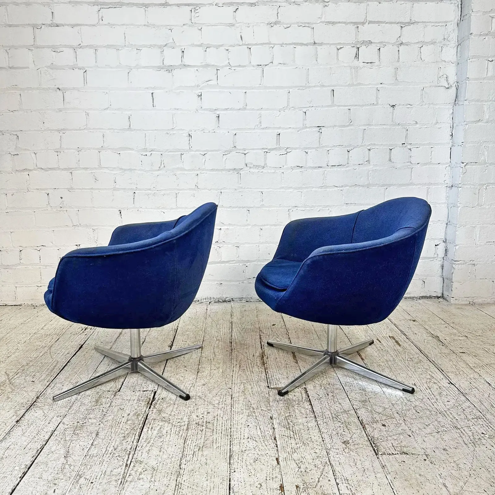 Pair of Overman Swivel Chairs